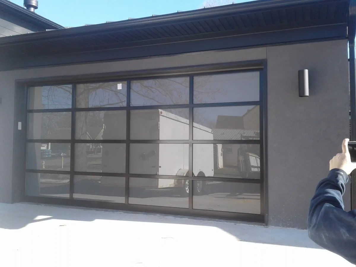 Commercial glass overhead garage door installed by Triple B Garage Doors