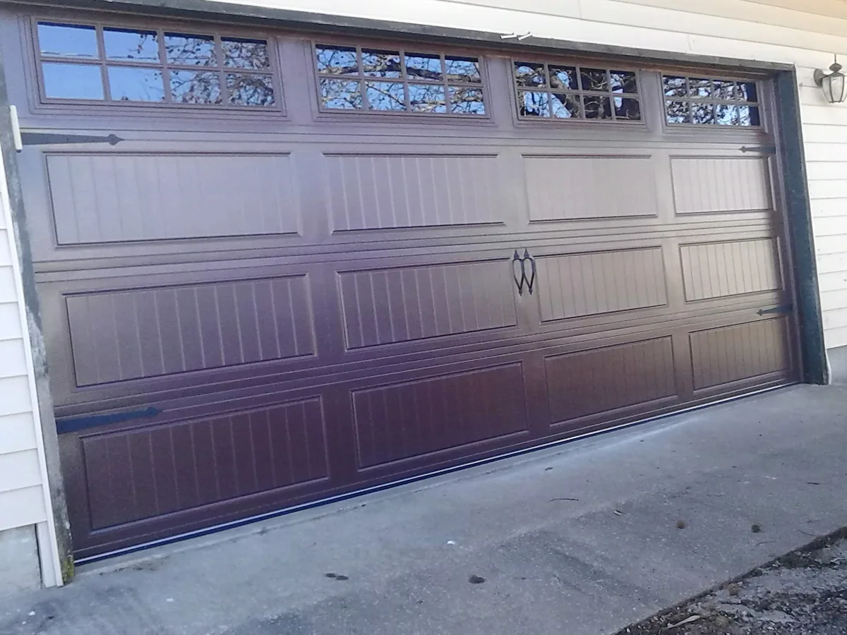 Wood-look residential garage door installation